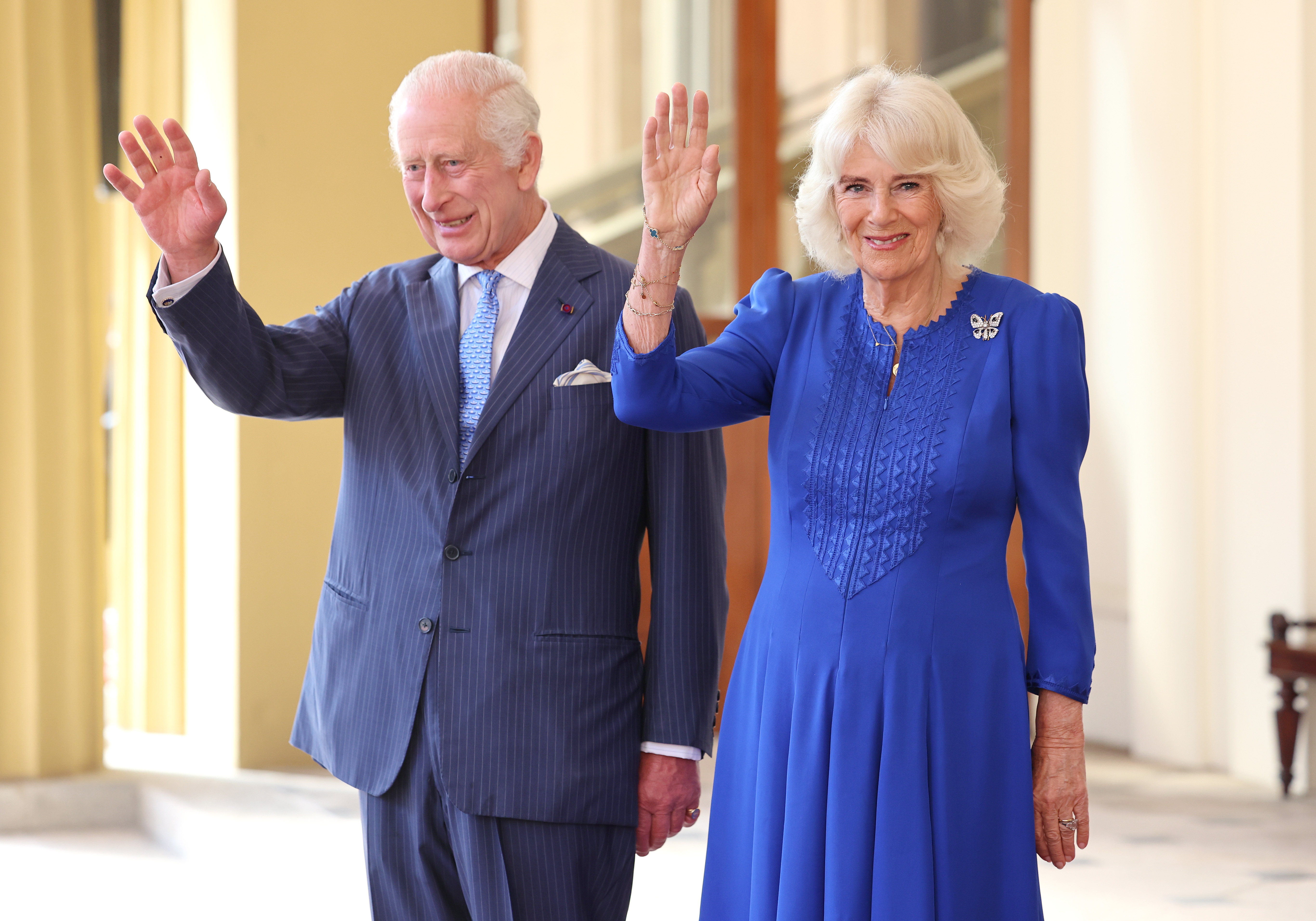 King Charles III and Queen Camilla smile and wave as they formally bid farewell to Emperor Naruhito and Empress Masako of Japan on the final day of their state visit to the United Kingdom at Buckingham Palace on June 27, 2024 in London, England. | Source: Getty Images