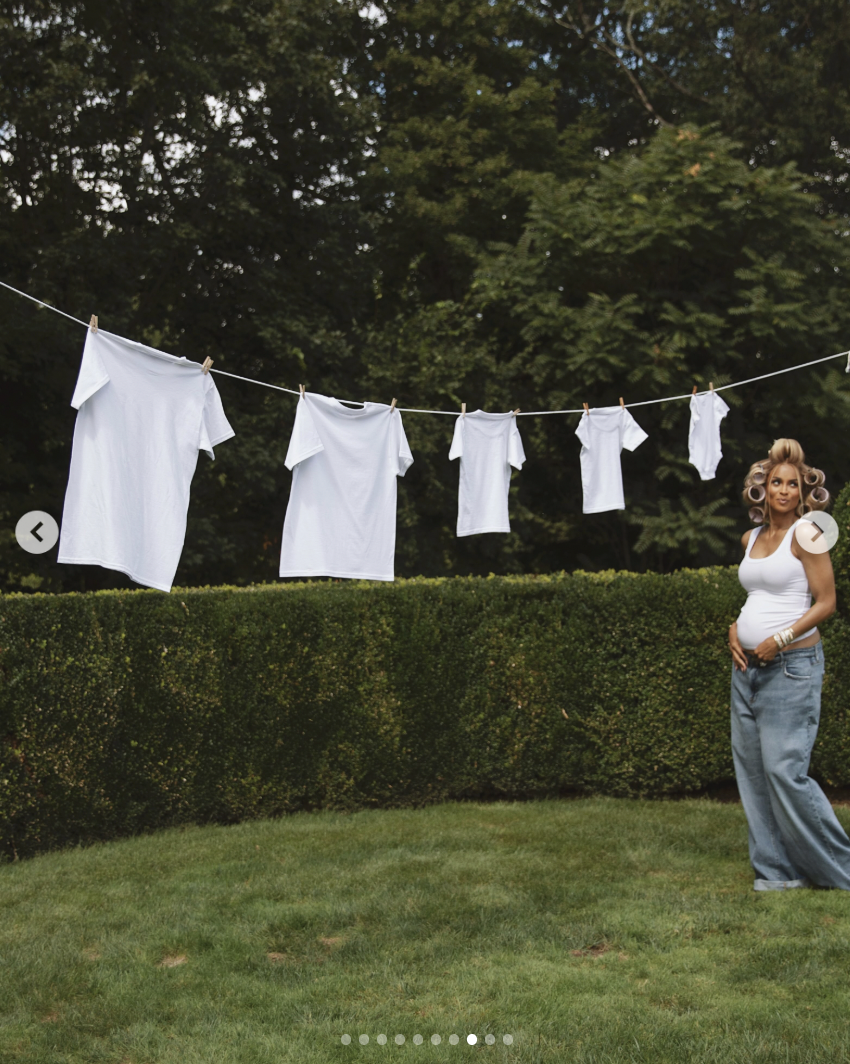 A pregnant Ciara stands by a clothesline with hung with five white shirts of ranging sizes from a post on September 6, 2026 | Source: instagram/ciara