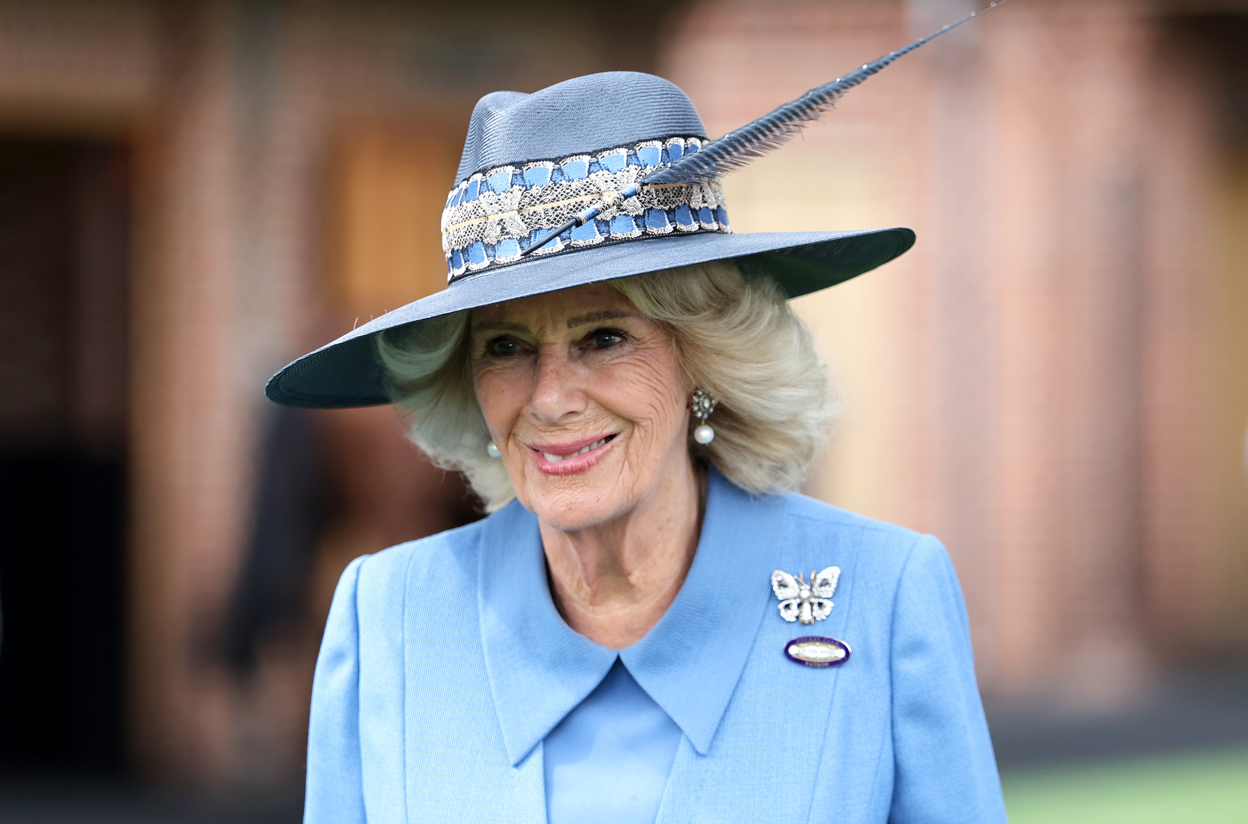 Queen Camilla, Patron of York Racecourse, smiles as she attends the first day of the Ebor Festival at York Racecourse on August 19, 2026 in York, England. | Source: Getty Images