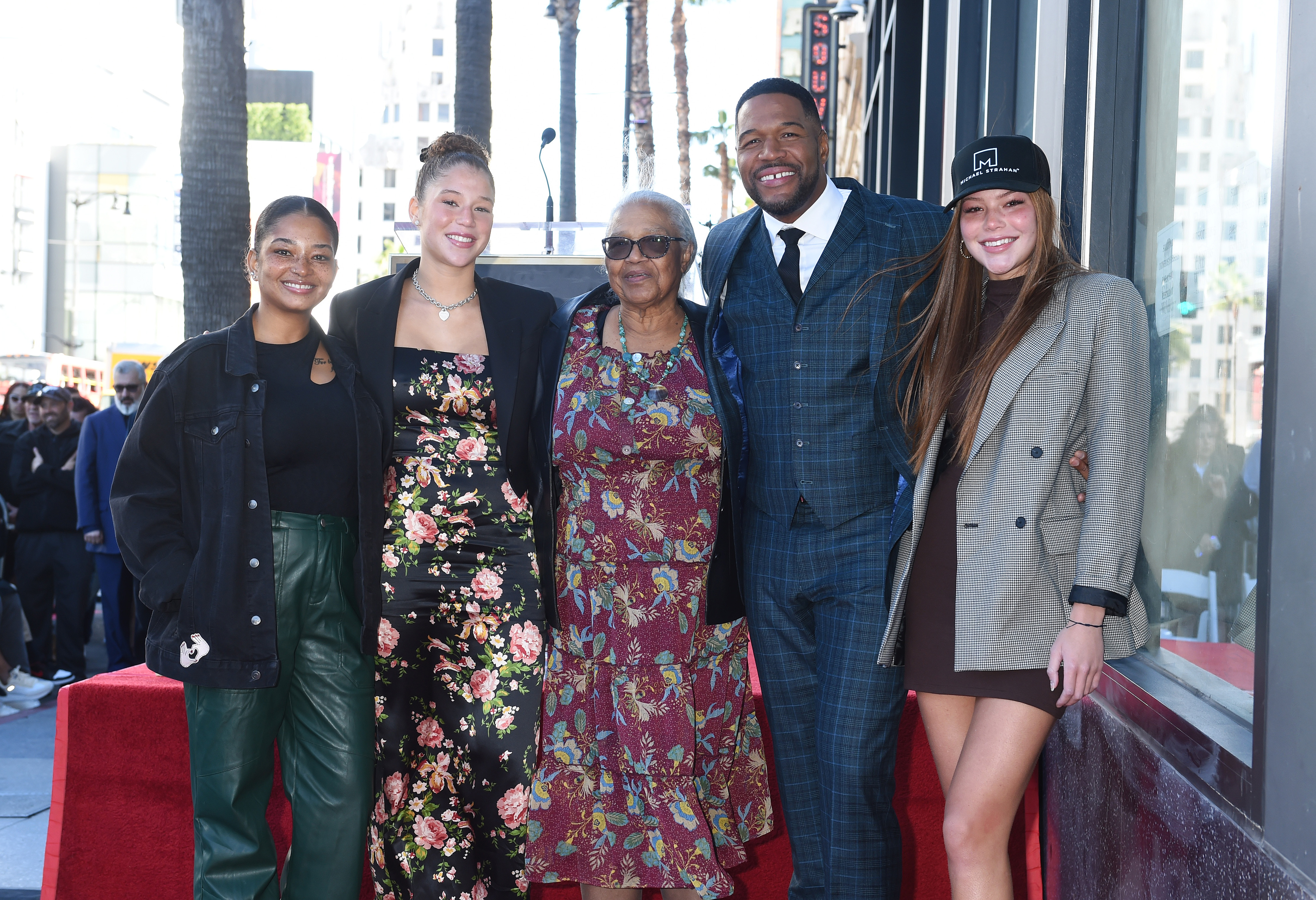 Tanita Strahan, Isabella Strahan, Louise Strahan, Michael Strahan, Sophia Strahan at the star ceremony where Michael Strahan is honored with the first Sports Entertainment star on the Hollywood Walk of Fame on January 23, 2023 | Source: Getty  Images